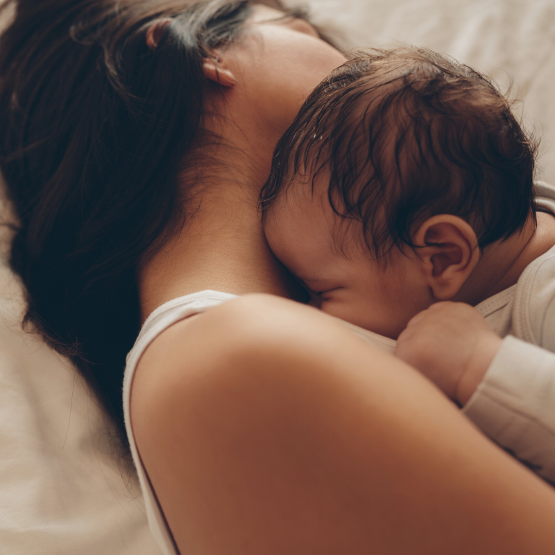 mom cuddling baby - why new moms need nourishment 